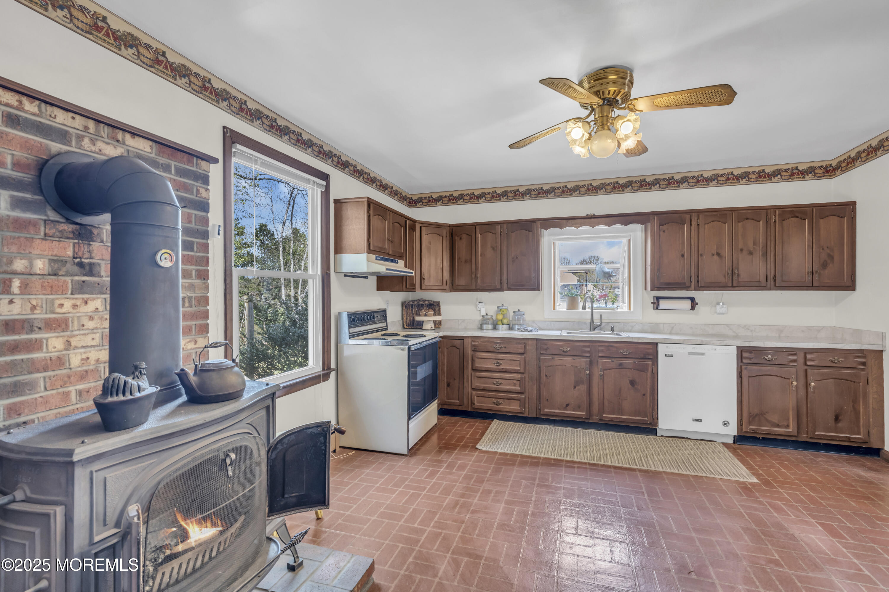 627 Beers Street Hazlet, NJ 07730 - Photo 26 of 64 a large kitchen with stainless steel appliances granite countertop a stove a sink dishwasher and a refrigerator