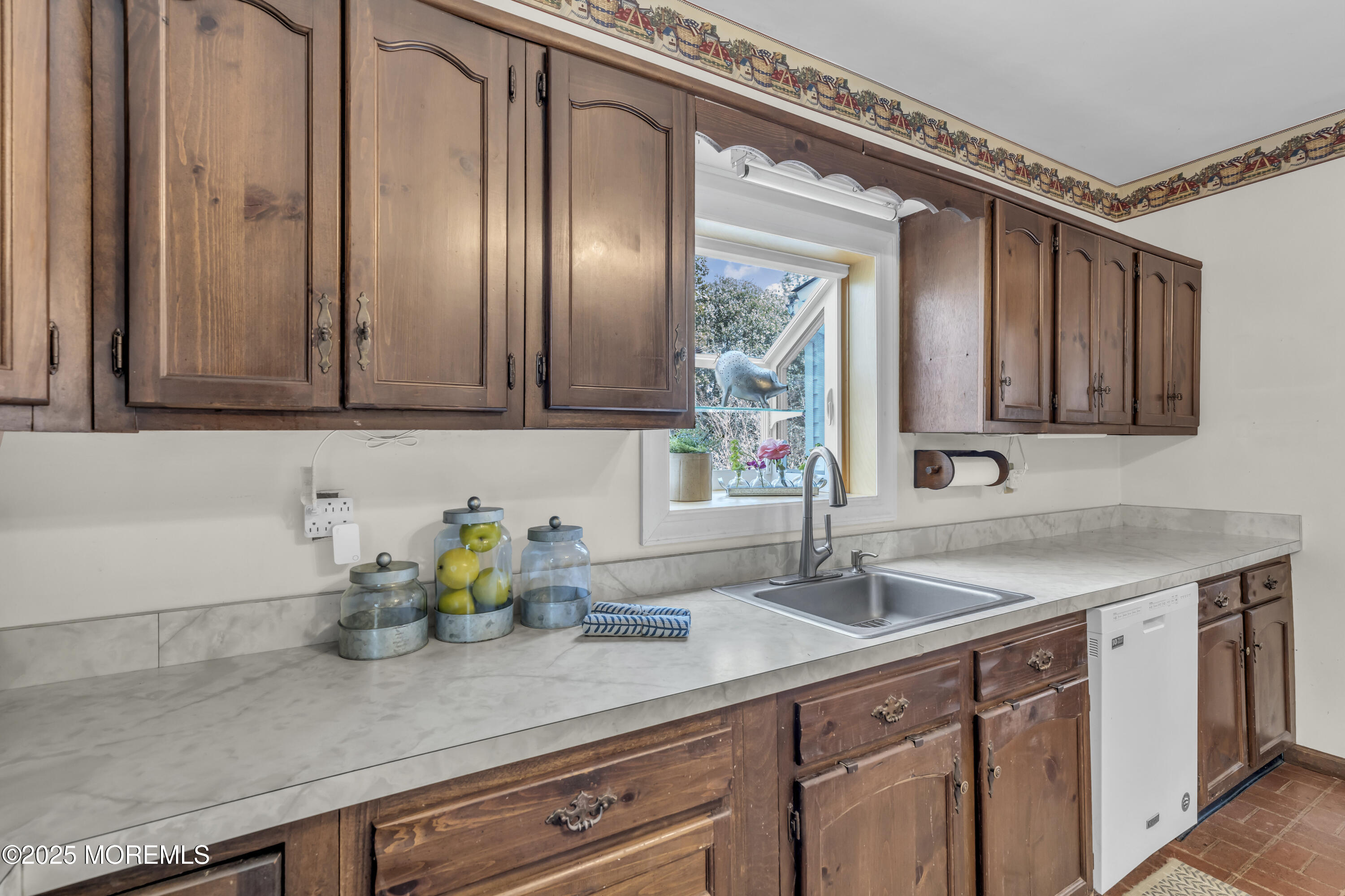 627 Beers Street Hazlet, NJ 07730 - Photo 27 of 64 a kitchen with stainless steel appliances granite countertop a sink and cabinets