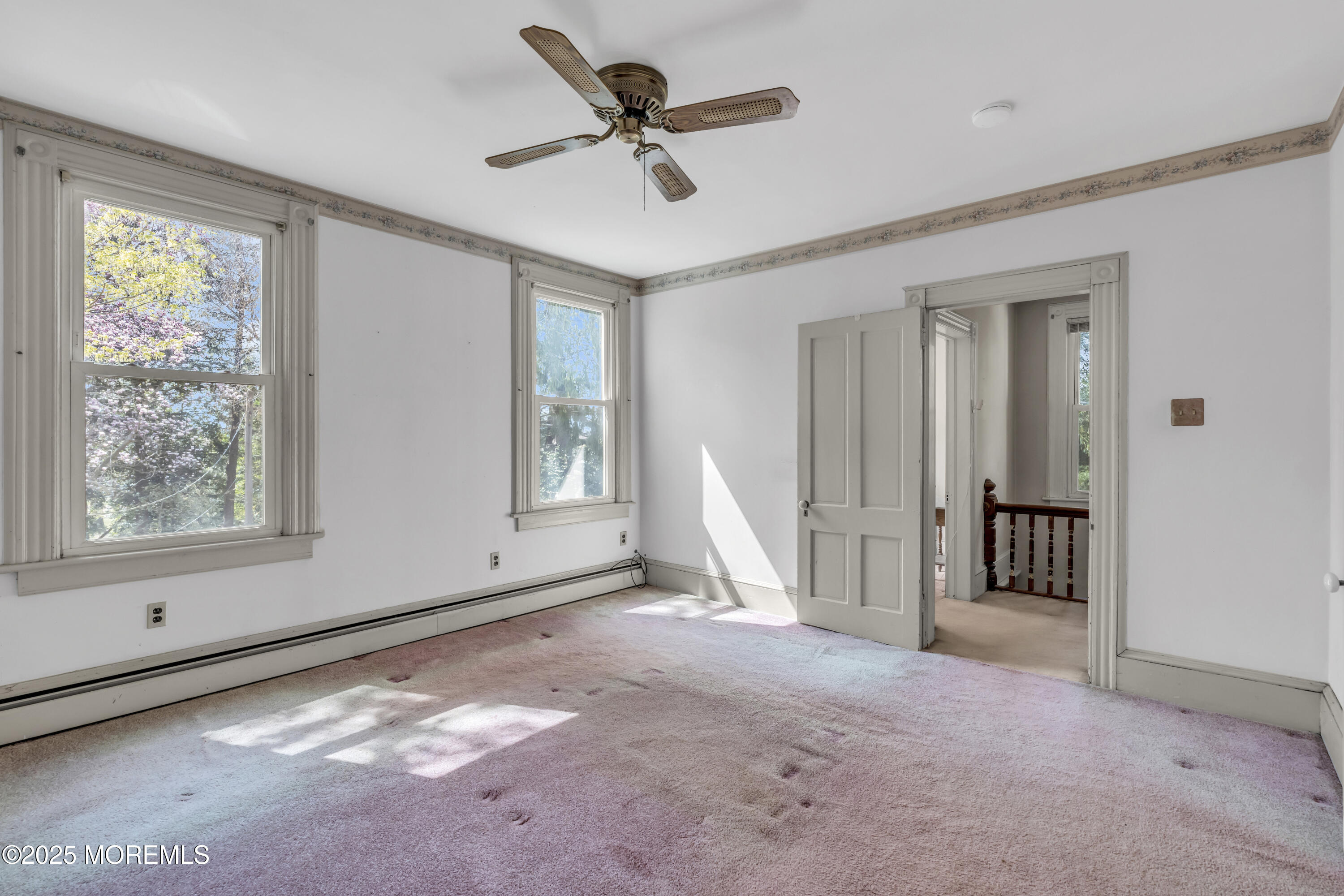 627 Beers Street Hazlet, NJ 07730 - Photo 29 of 64 a view of livingroom with hardwood floor and a ceiling fan