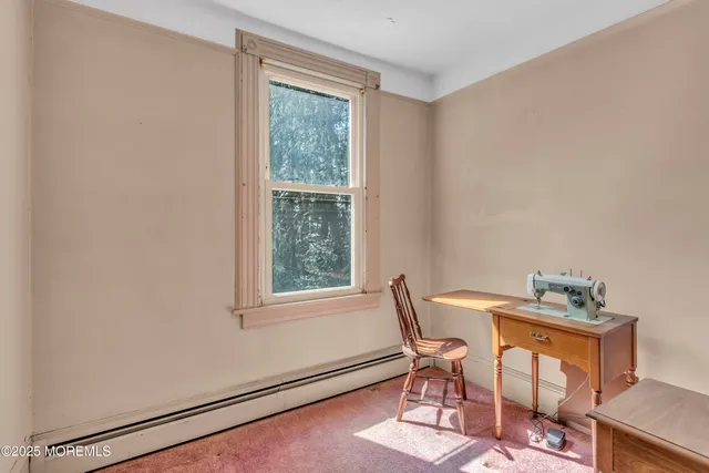 a view of a livingroom with a flat screen tv