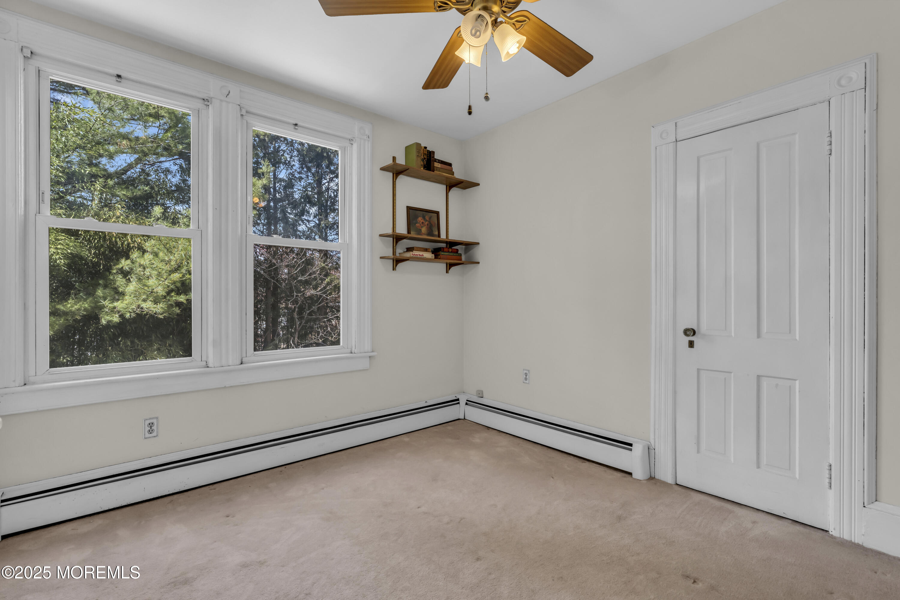 627 Beers Street Hazlet, NJ 07730 - Photo 34 of 64 a view of an empty room with a window