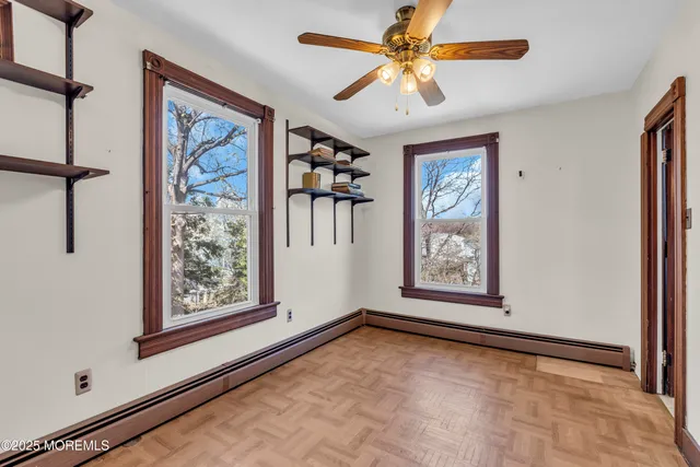 a view of a chairs and tables in the yard