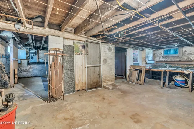 a view of a yard with wooden fence