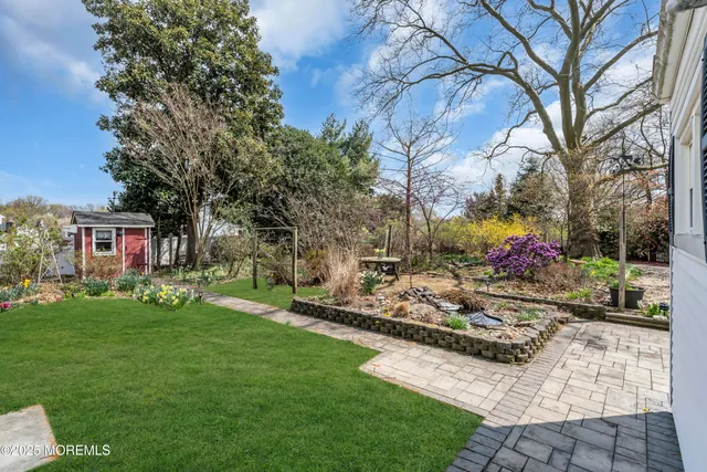 a view of backyard with outdoor space