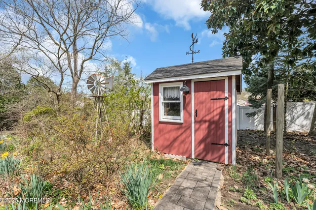 a view of a pathway with a yard