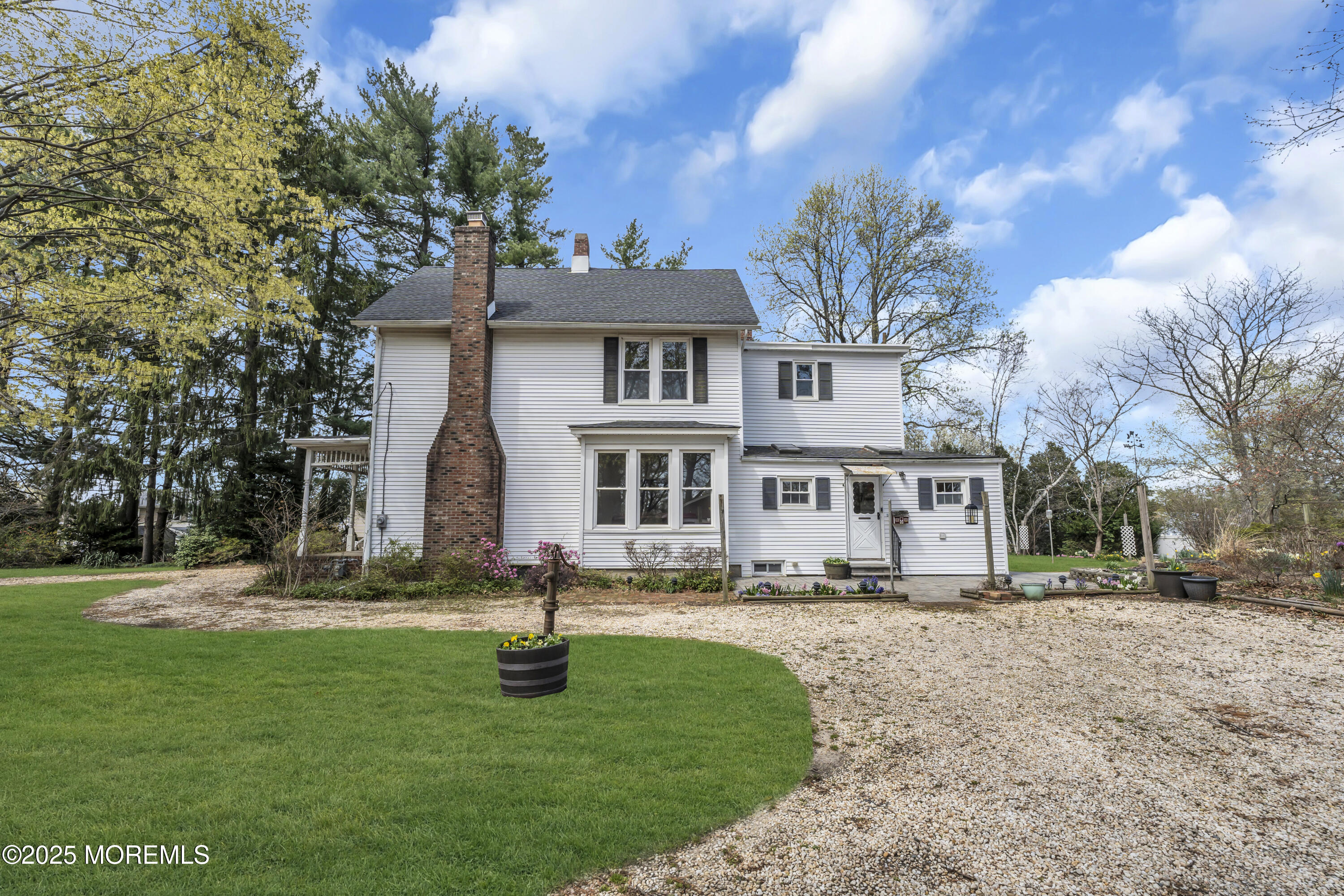 627 Beers Street Hazlet, NJ 07730 - Photo 50 of 64 a front view of a house with a yard