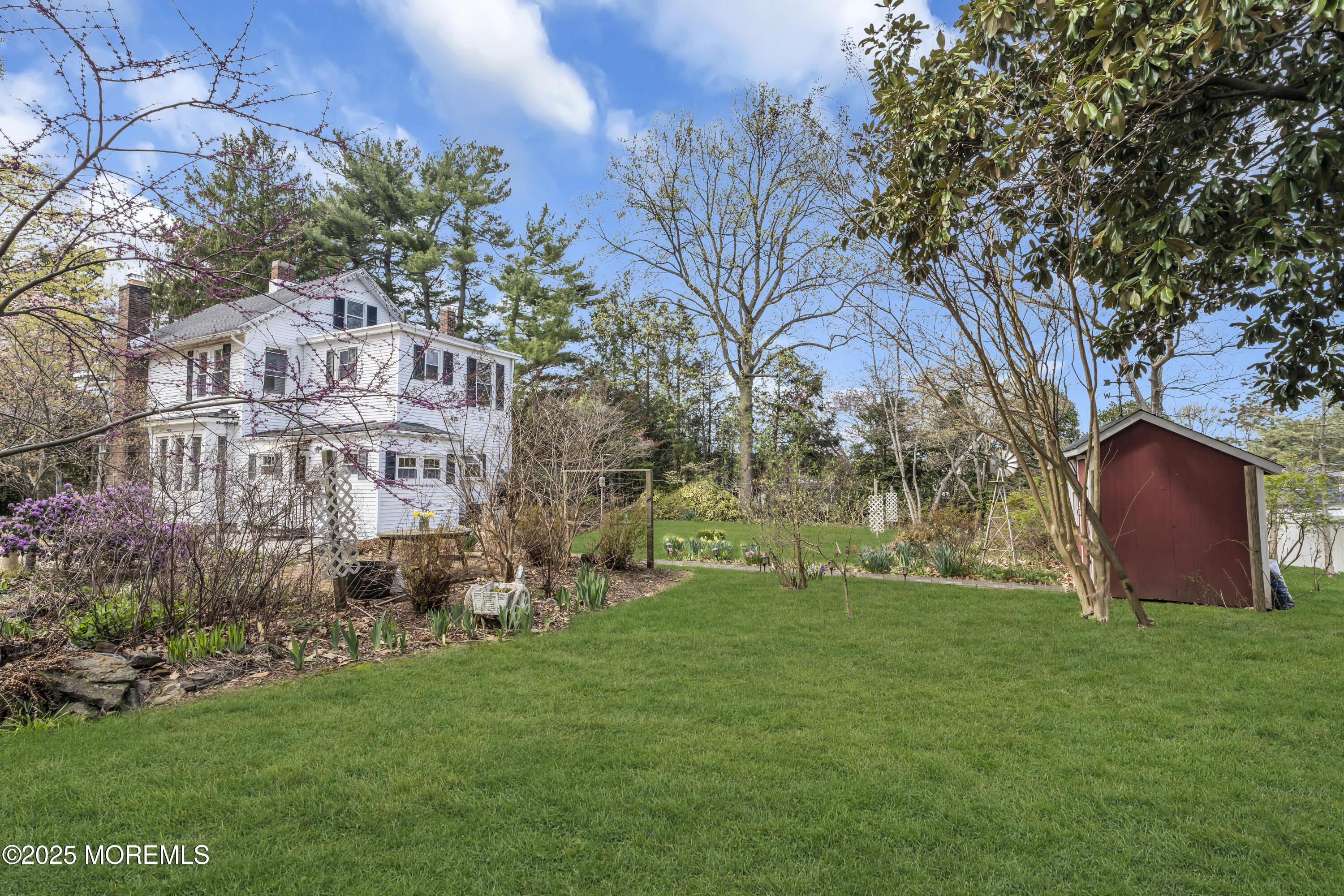 627 Beers Street Hazlet, NJ 07730 - Photo 52 of 64 a view of a house with a yard