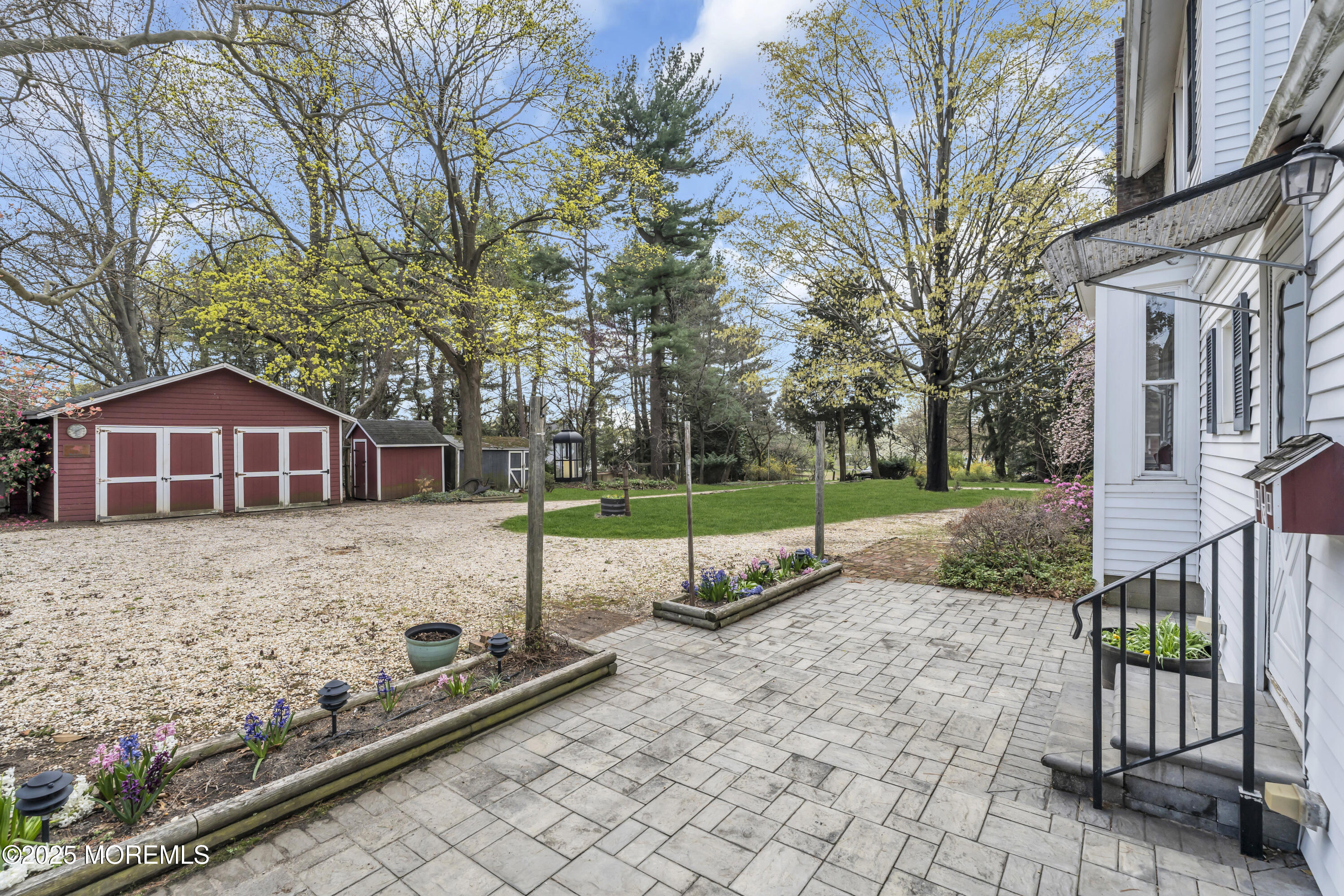 627 Beers Street Hazlet, NJ 07730 - Photo 55 of 64 a view of a yard with wooden fence