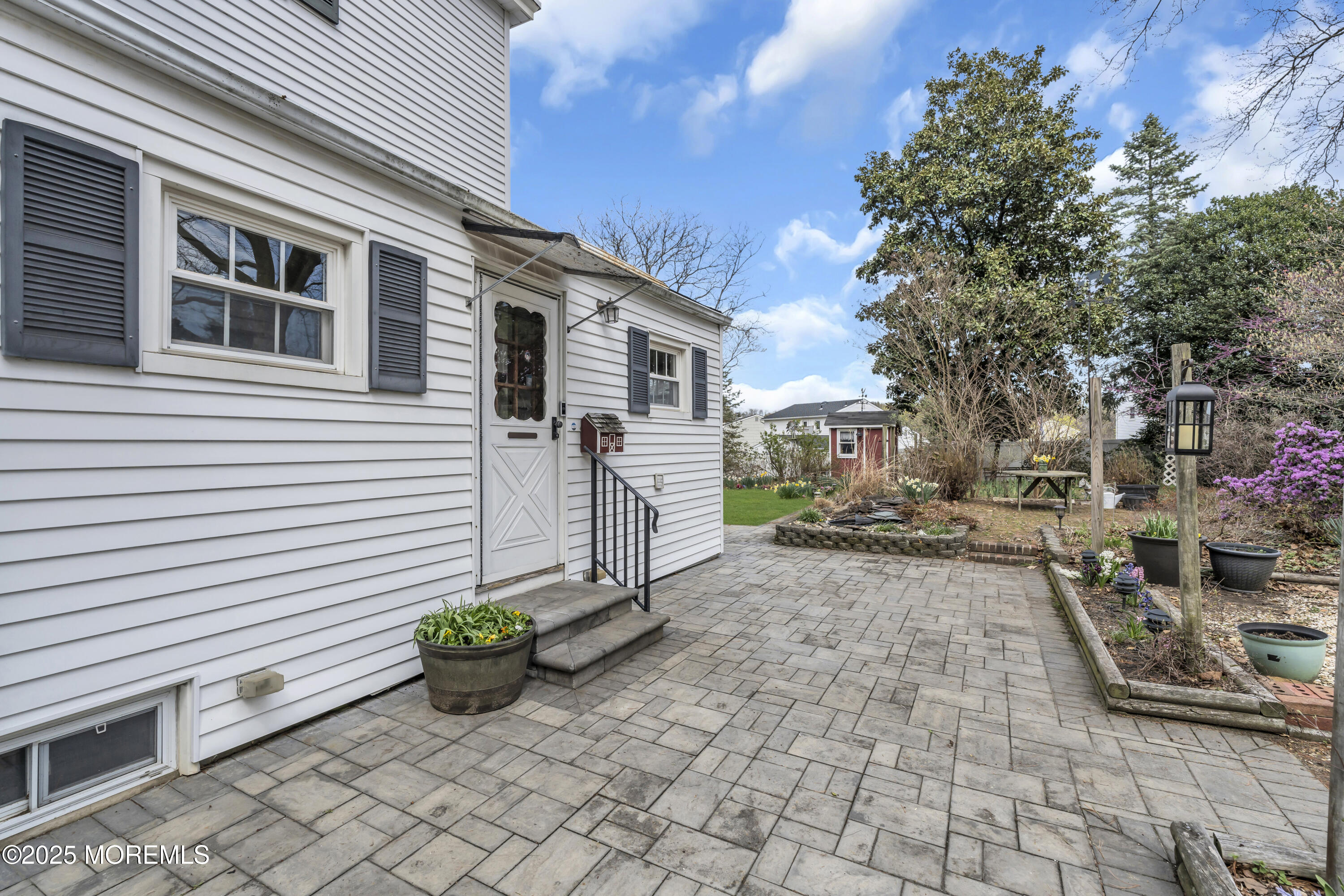 627 Beers Street Hazlet, NJ 07730 - Photo 57 of 64 a view of a backyard with sitting area