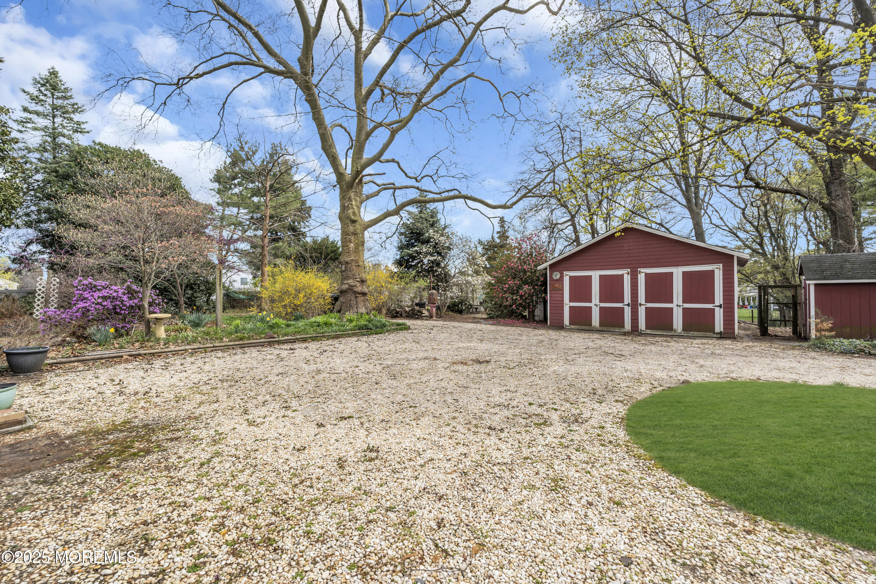 627 Beers Street Hazlet, NJ 07730 - Photo 58 of 64 a front view of a house with garden