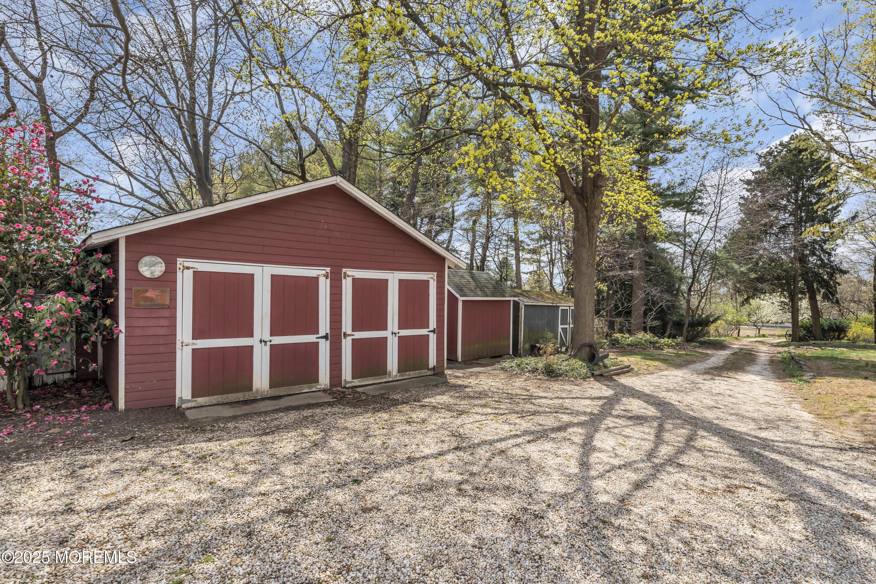 627 Beers Street Hazlet, NJ 07730 - Photo 60 of 64 a front view of a house with a yard
