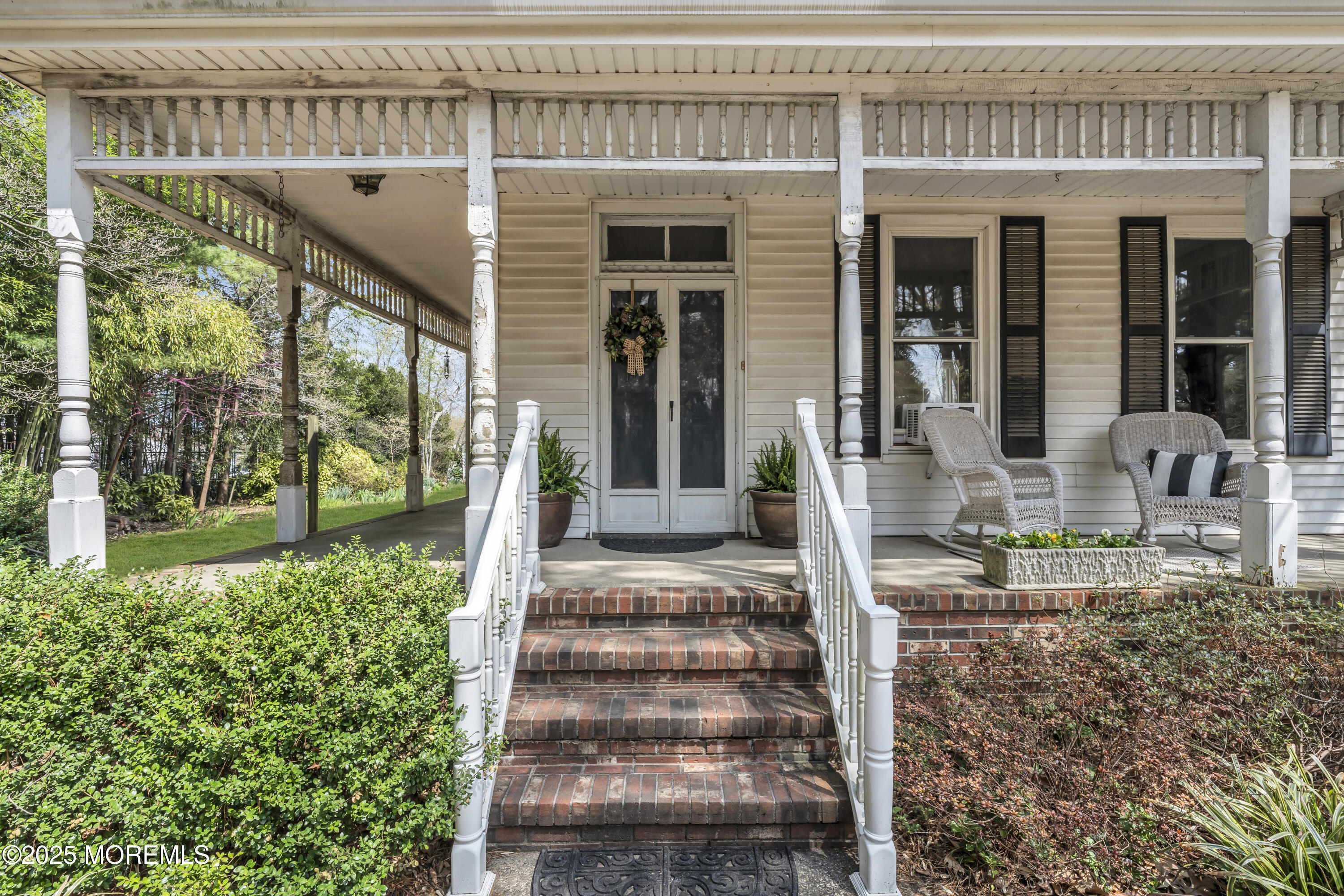 627 Beers Street Hazlet, NJ 07730 - Photo 6 of 64 a front view of a house with outdoor seating and plants