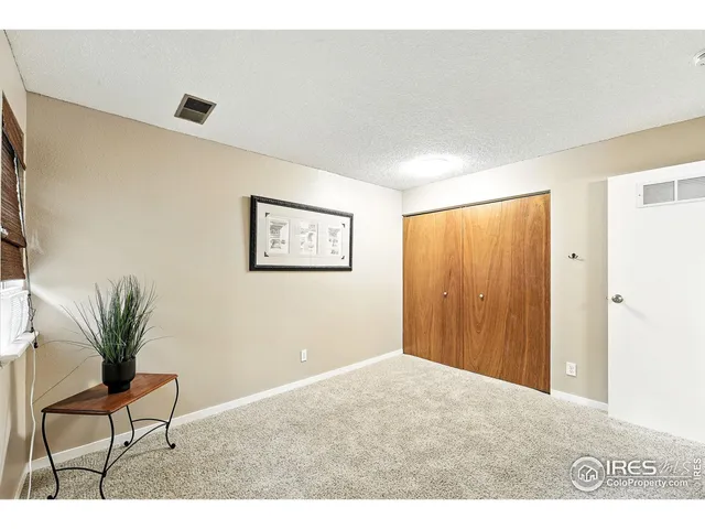 a bathroom with a sink double vanity granite tub shower and a mirror