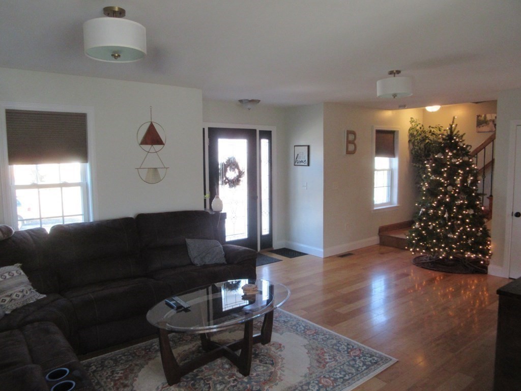 418 Smith Street Fall River, MA 02721 - Photo 16 of 37 a living room with furniture and a window