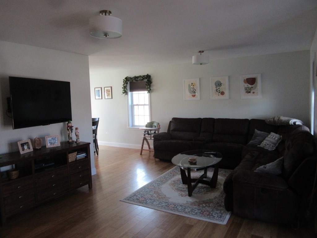418 Smith Street Fall River, MA 02721 - Photo 19 of 37 a living room with furniture and a flat screen tv
