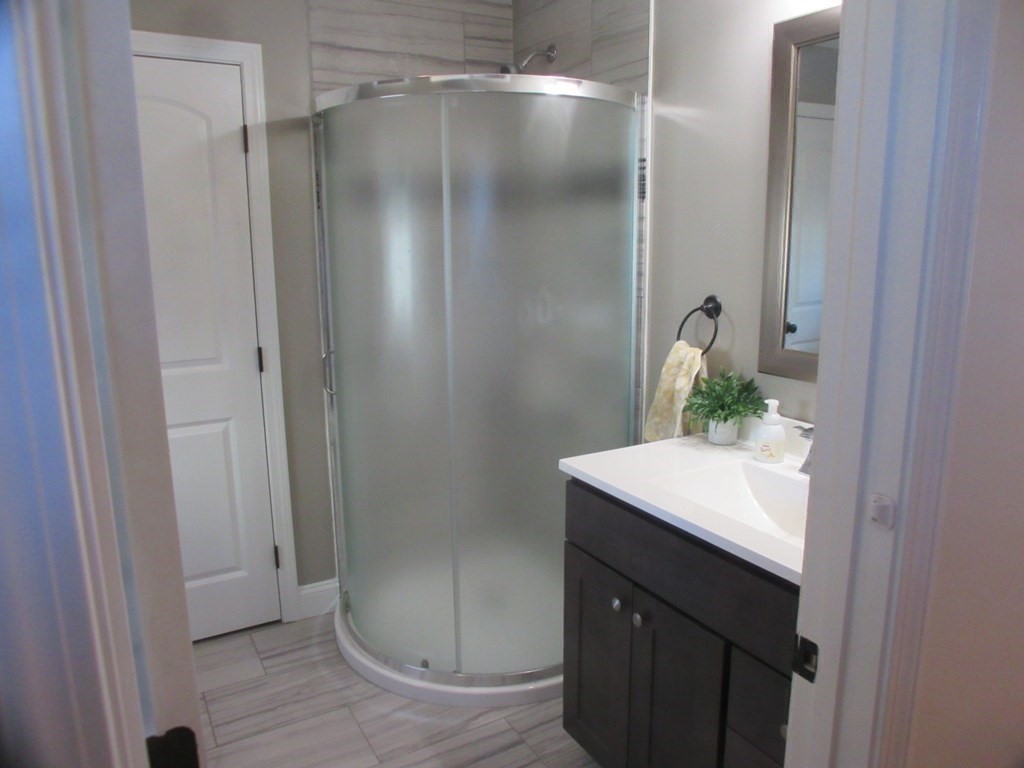 418 Smith Street Fall River, MA 02721 - Photo 20 of 37 a bathroom with a shower and a sink