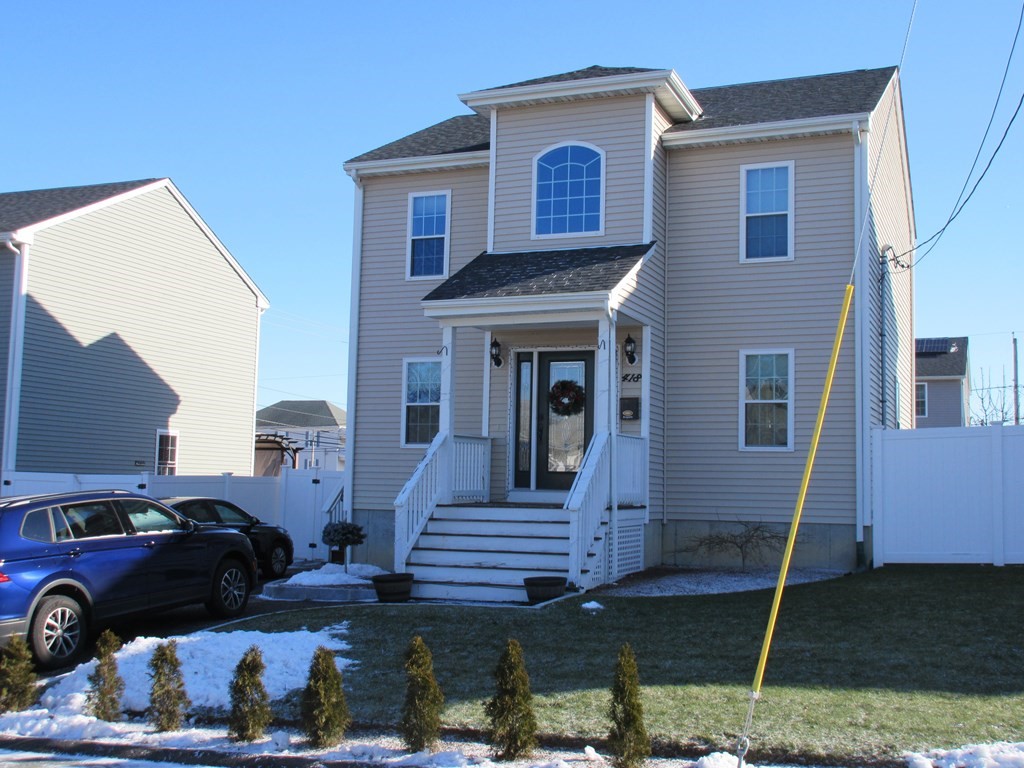 418 Smith Street Fall River, MA 02721 - Photo 2 of 37 a front view of a house with garden