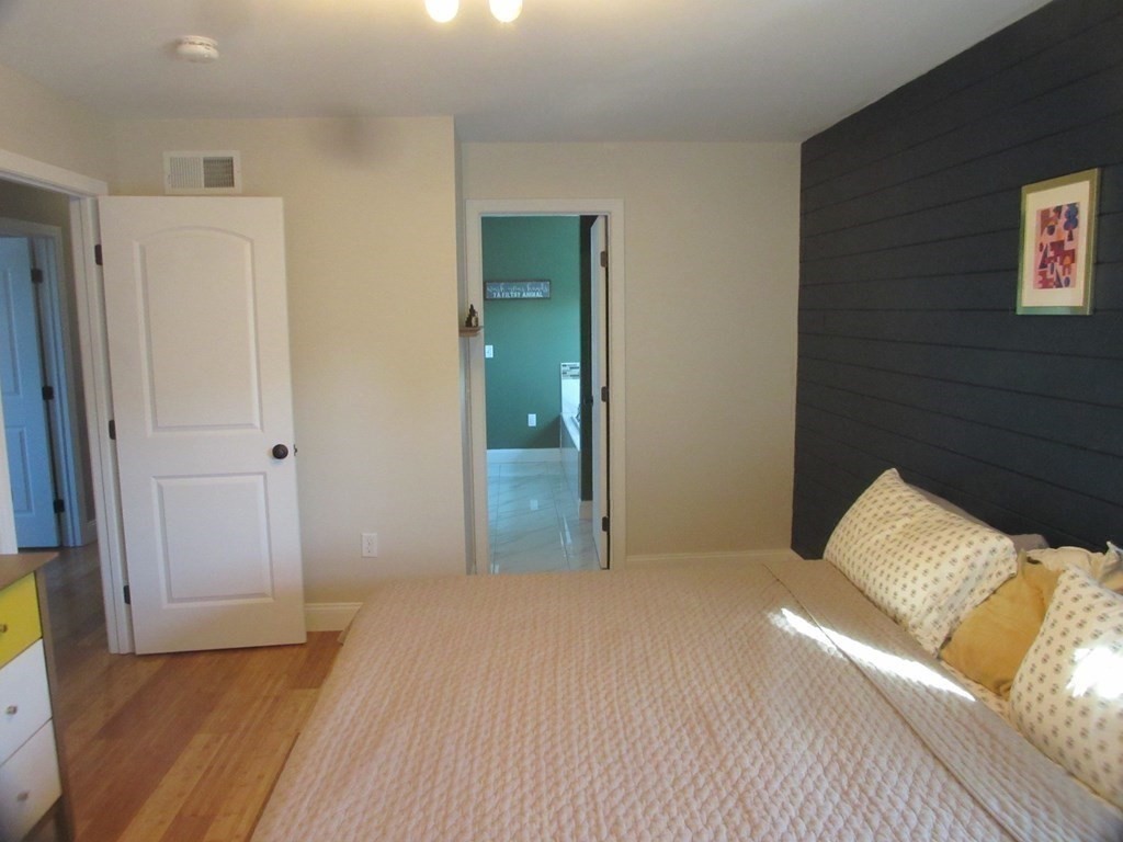 418 Smith Street Fall River, MA 02721 - Photo 25 of 37 a bedroom with a bed and a painting