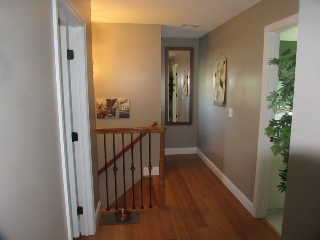 418 Smith Street Fall River, MA 02721 - Photo 32 of 37 a view of a hallway with wooden floor and entryway