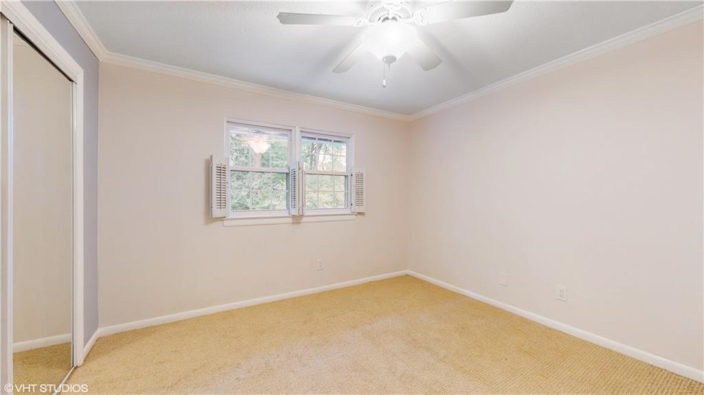 1177 Church Street, Unit C Decatur, GA 30030 - Photo 17 of 27 an empty room with a window