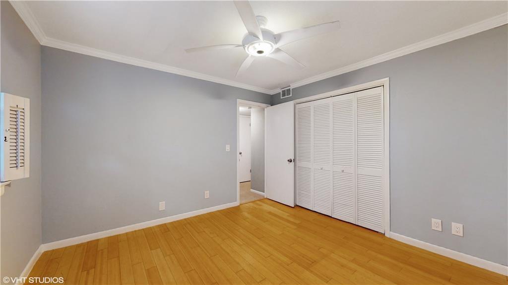 1177 Church Street, Unit C Decatur, GA 30030 - Photo 20 of 27 a view of a room with a ceiling fan and wooden floor