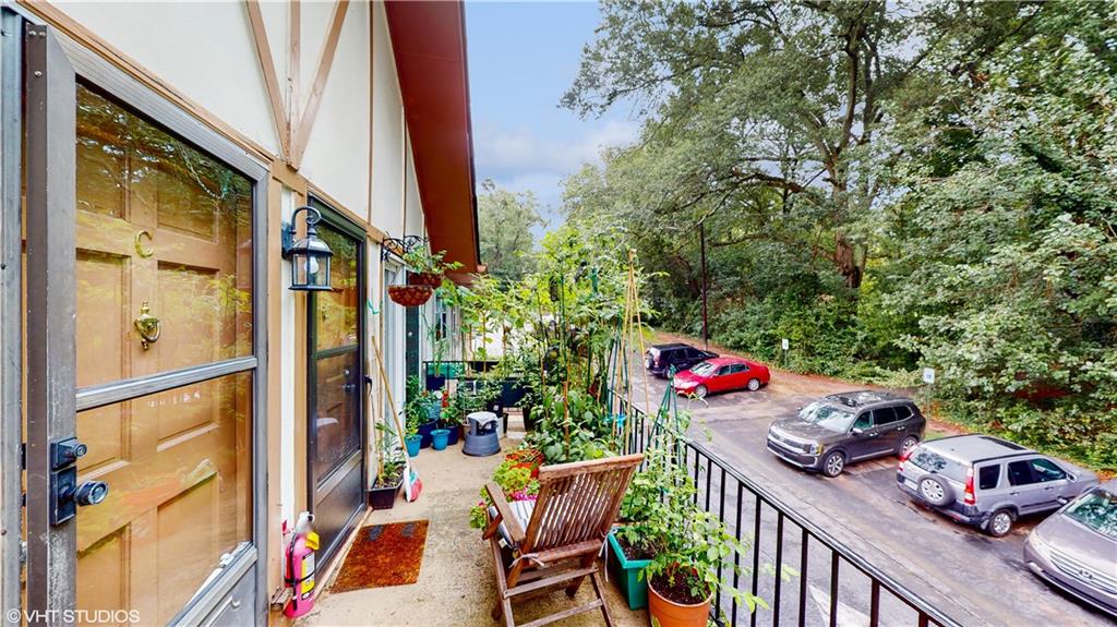 1177 Church Street, Unit C Decatur, GA 30030 - Photo 3 of 27 a view of a balcony with an outdoor seating