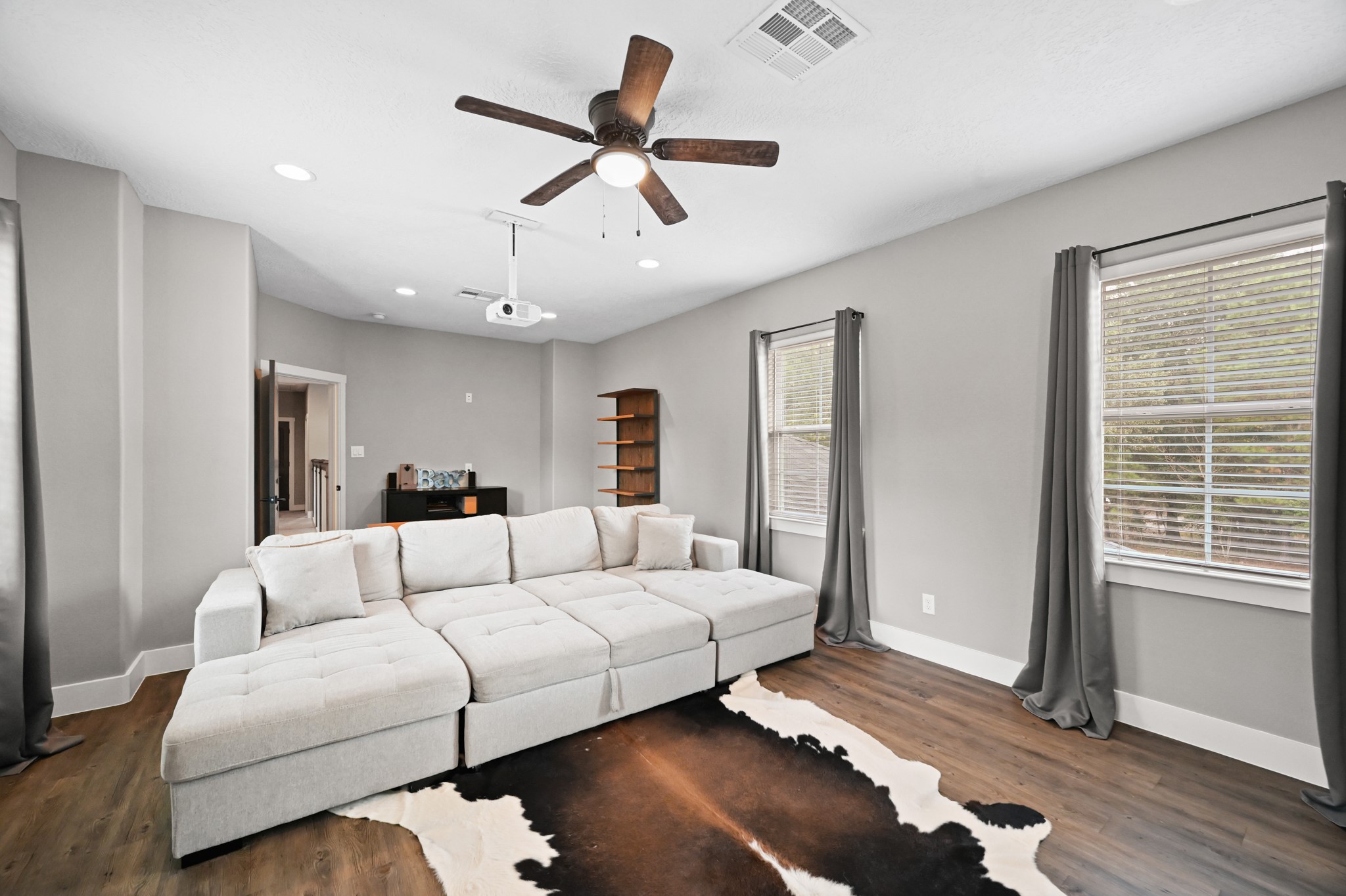 16912 Wagon Wheel Road Stagecoach, TX 77355 - Photo 32 of 39 a living room with furniture and a window