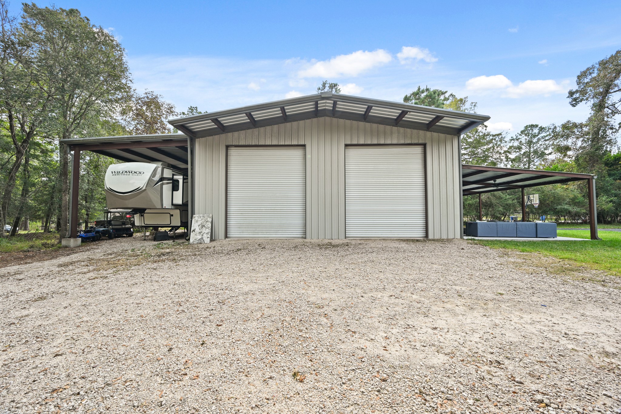16912 Wagon Wheel Road Stagecoach, TX 77355 - Photo 5 of 39 a view of a house with a outdoor space