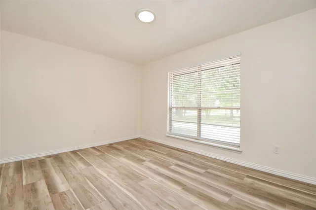 an empty room with a window