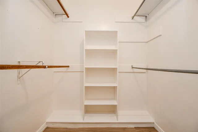 a view of a room with racks on the wall