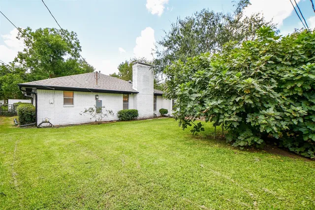 a house view with a garden space