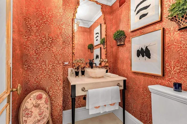 a bathroom with a granite countertop tub and a window
