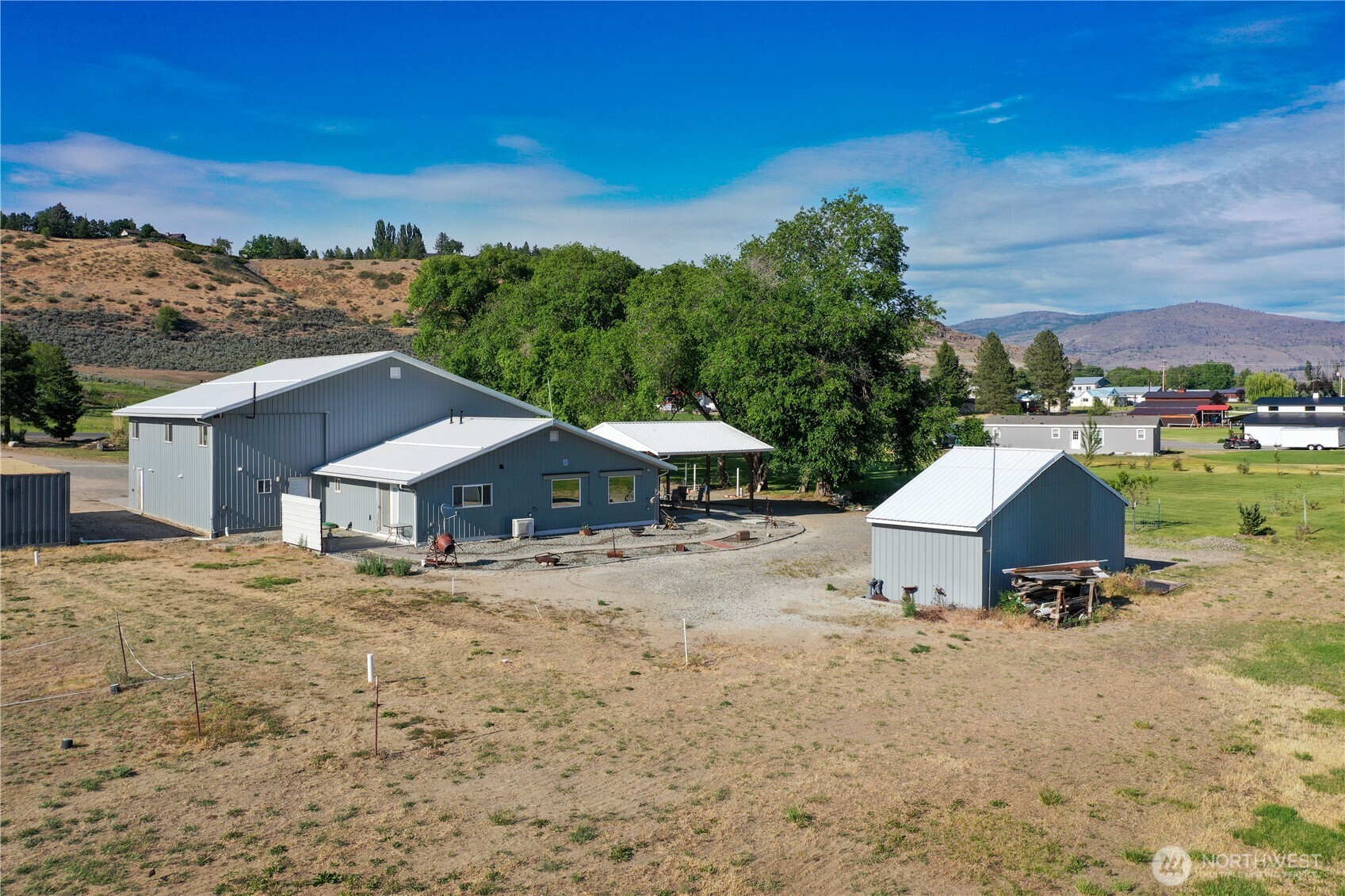 46 Shumway Road Omak, WA 98841 - Photo 35 of 40 a view of a house with a yard
