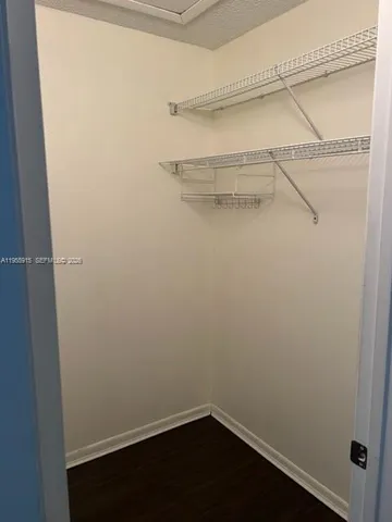 a view of a room with racks on the wall