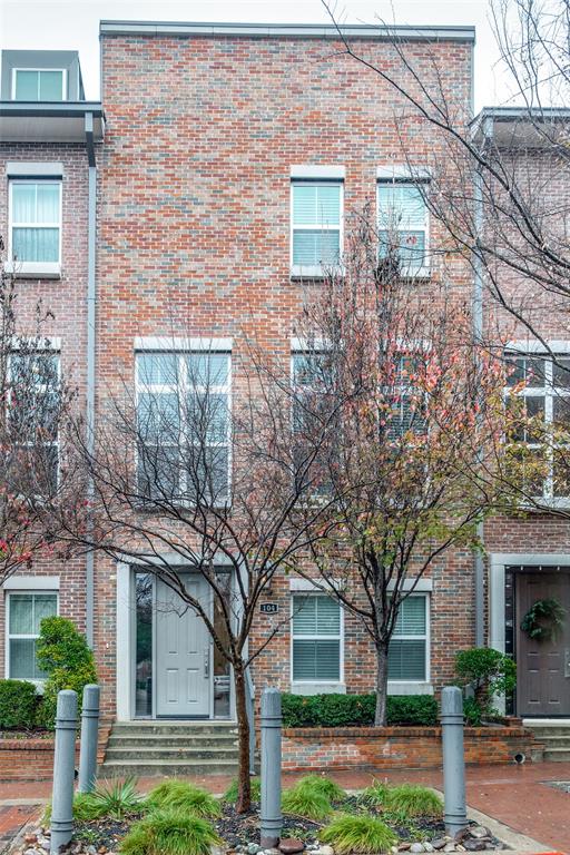 7700 Eastern Avenue, Unit 104 Dallas, TX 75209 - Photo 1 of 25 a front view of a house with garden