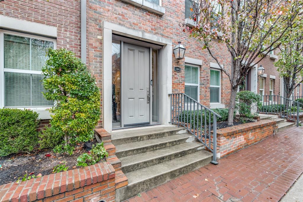 7700 Eastern Avenue, Unit 104 Dallas, TX 75209 - Photo 3 of 25 a view of a house with a small yard and plants