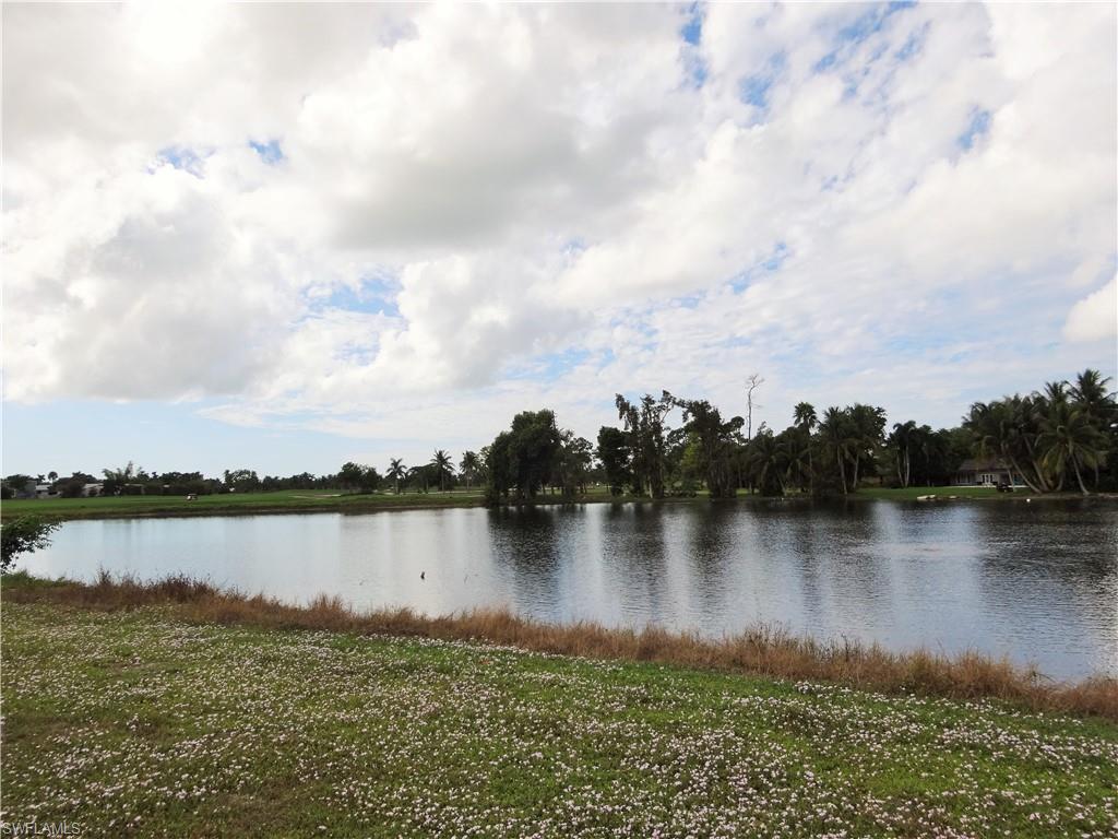 610 Banyan Circle Naples, FL 34102 - Photo 3 of 15 a view of a lake