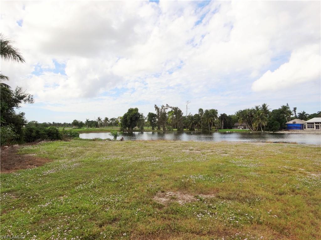 610 Banyan Circle Naples, FL 34102 - Photo 4 of 15 a view of an ocean from a lake