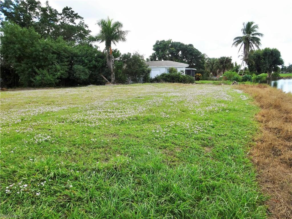 610 Banyan Circle Naples, FL 34102 - Photo 8 of 15 a view of a garden with a house
