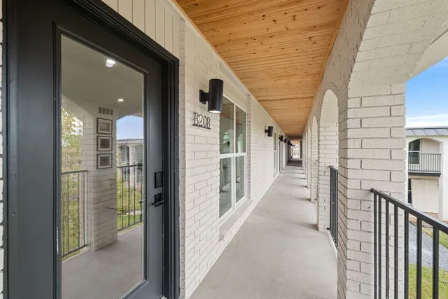 a view of a porch with seating space