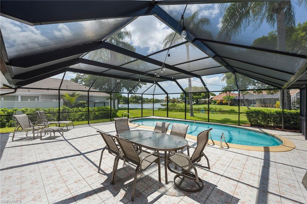 900 Hidden Harbour Drive Naples, FL 34109 - Photo 24 of 32 a outdoor view with a sitting space
