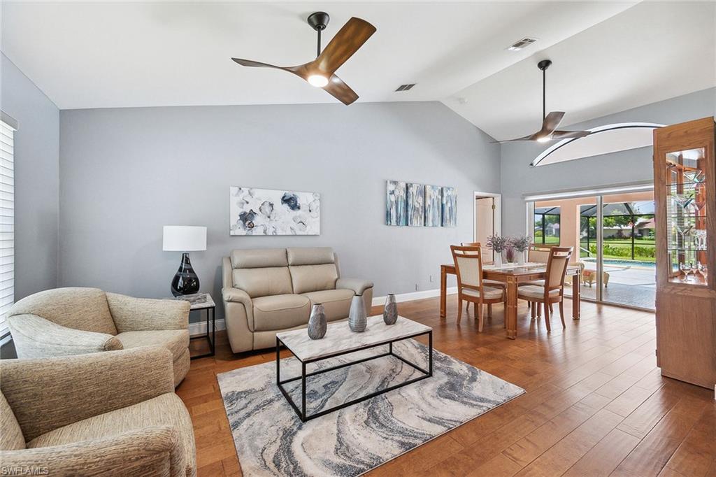 900 Hidden Harbour Drive Naples, FL 34109 - Photo 4 of 32 a living room with furniture