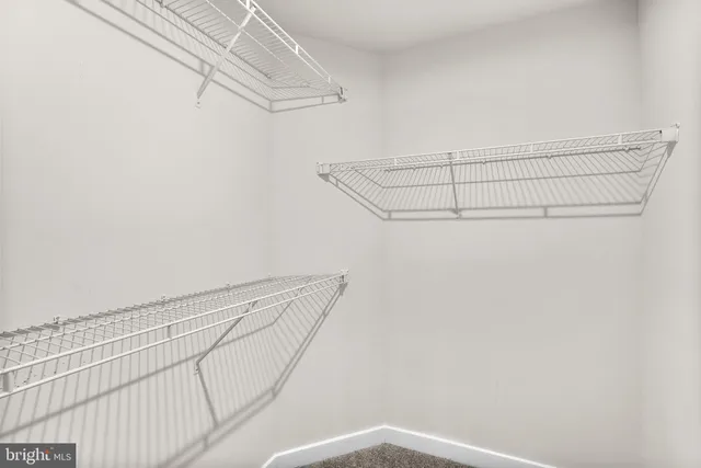 a view of a room with racks on the wall