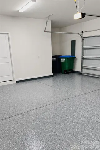 a view of empty room with stairs