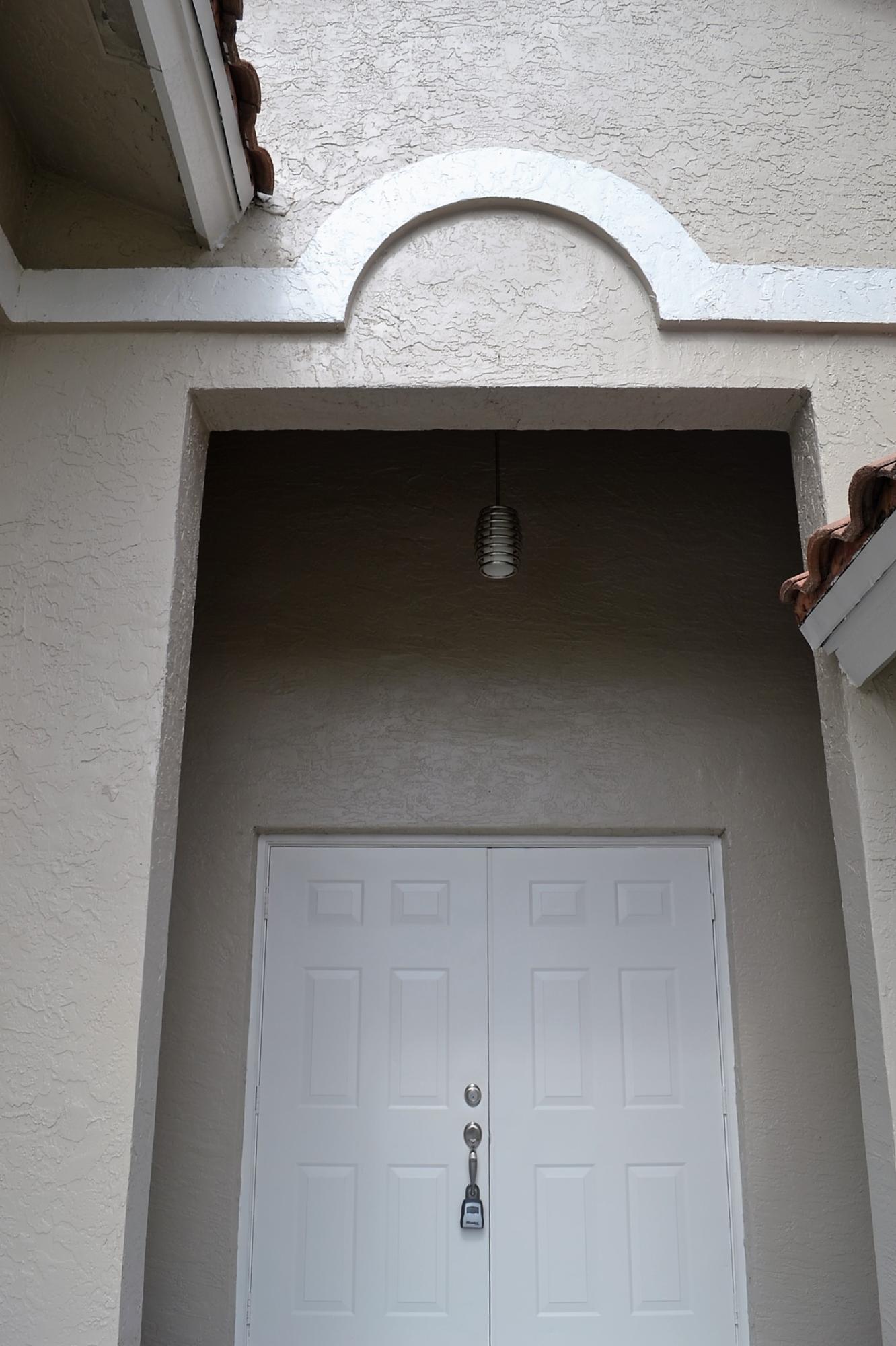 9540 El Clair Ranch Road Boynton Beach, FL 33437 - Photo 3 of 26 a closeup of a cabinet