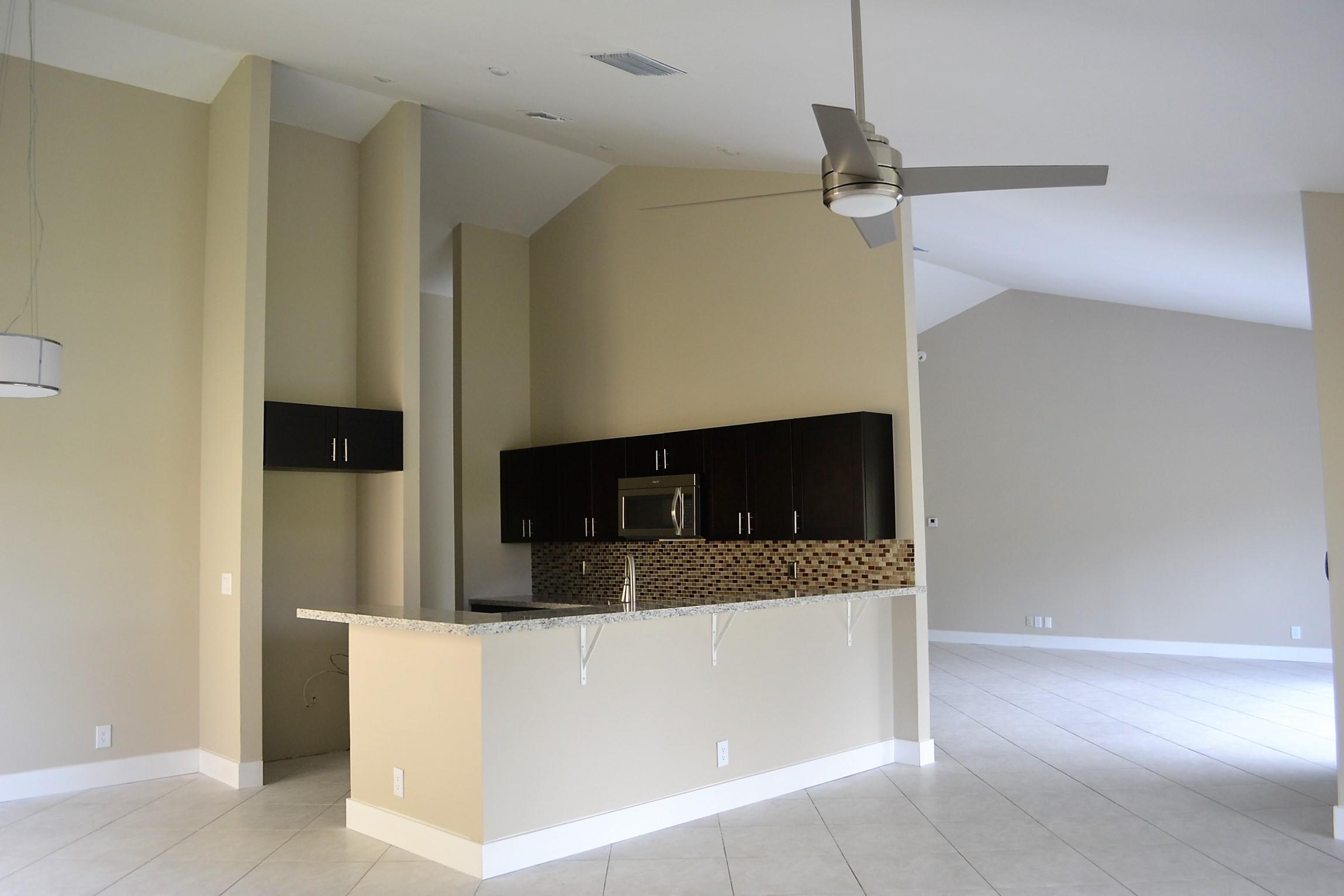 9540 El Clair Ranch Road Boynton Beach, FL 33437 - Photo 6 of 26 a view of utility room