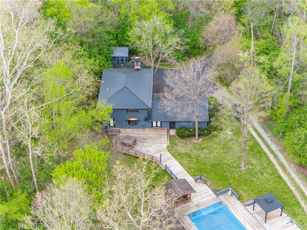 6750 Little Twin Road Germantown, OH 45327 - Photo 76 of 88 This secluded residence offers ample outdoor living with a spacious deck and inviting pool area.