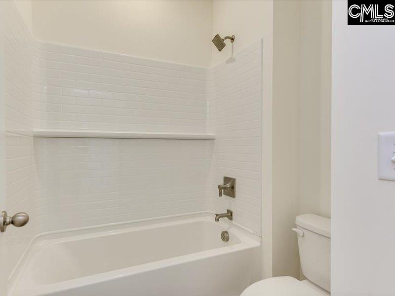 628 Old Charleston Road Pelion, SC 29123 - Photo 32 of 36 a bathroom with a bathtub