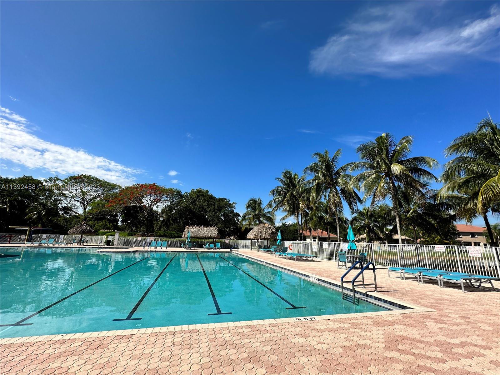 The Ridges Weston, FL 33331 - Photo 22 of 26 a view of a swimming pool with a patio