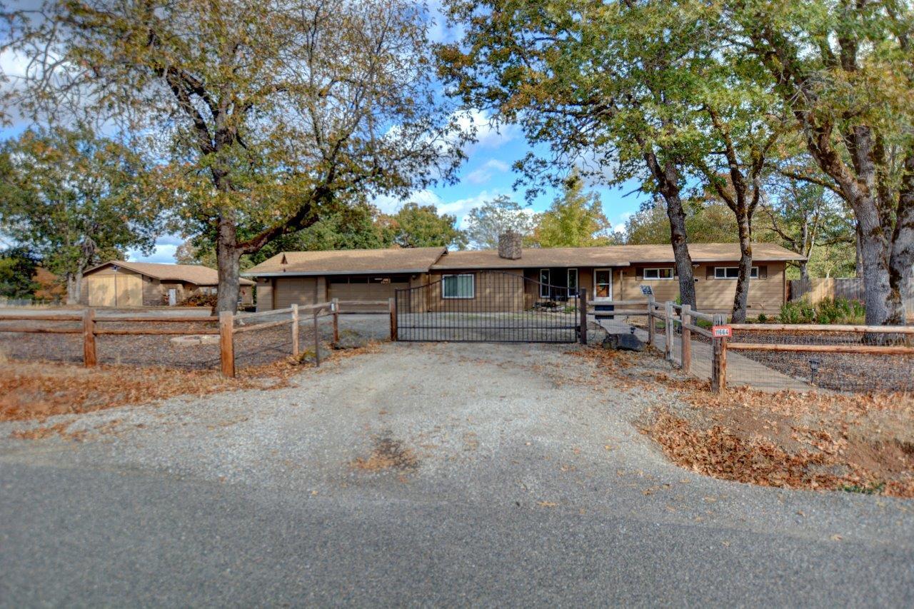 11664 Duggan Road White City, OR 97503 - Photo 6 of 42 Gated entrance with Circle drive to the next entrance by the RV barn